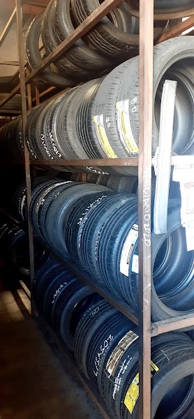 Classic 1964 Chevrolet Impala getting custom chrome wheels at Preciado Tires