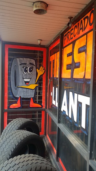 Tire inventory rack stocked with new tires at Preciado Tires Pomona