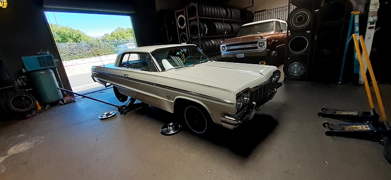 Preciado Tires workshop interior with tire inventory and equipment